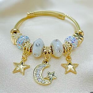 Gold and White Charm Bracelet